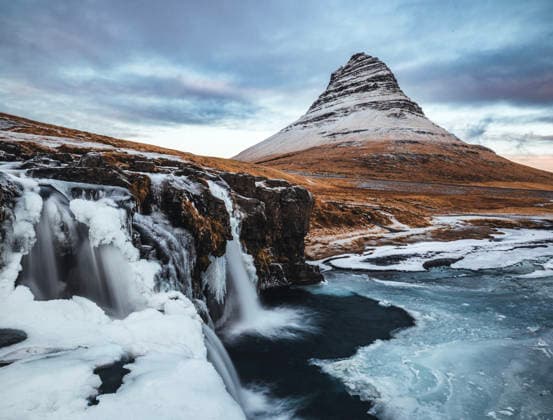Kirkjufell waterfall and mountain on cold winter day, Iceland Grundarfjörður, Grundarfjarðarbær, Iceland CR_SSNF260308E-1943241-01