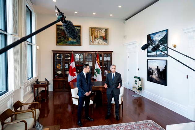 March 9, 2026, Ottawa, On, Canada: Prime Minister Mark Carney, right, speaks as he meets with Premier of Prince Edward Island Rob Lantz in his office in Ottawa on Monday, March 9, 2026. Ottawa Canada  - ZUMAc35_ 20260309_zaf_c35_005 Copyright: xSpencerxColbyx