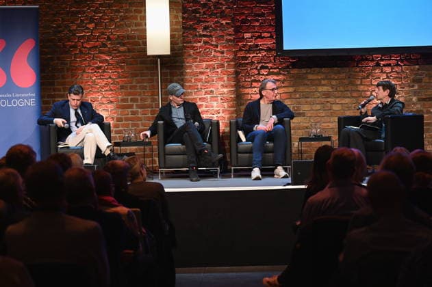 Die Autoren Lenz Koppelstätter, l-r, Tom Hillenbrand, Wolfgang Schorlau und Moderatorin Margarete von Schwarzkopf lesen und srechen auf der Bühne der Lit.Cologne, dem internationalen Literaturfestival mit dem Thema Gemordet wird überall!
