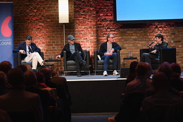 Die Autoren Lenz Koppelstätter, l-r, Tom Hillenbrand, Wolfgang Schorlau und Moderatorin Margarete von Schwarzkopf lesen und srechen auf der Bühne der Lit.Cologne, dem internationalen Literaturfestival mit dem Thema Gemordet wird überall!