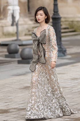 PFW Louis Vuitton Arrivals NB Dongyu Zhou arrived at the Louis Vuitton Womenswear Fall Winter 2026-2027 show as part of Paris Fashion Week on March 10, 2026 in Paris, France. Photo by Nasser Berzane ABACAPRESS.COM Paris France  Copyright: xBerzanexNasser ABACAx