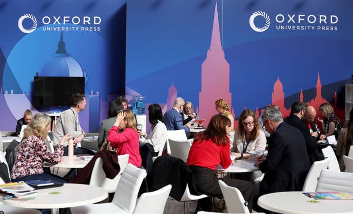 (260311) -- LONDON, March 11, 2026 -- People talk at the 2026 London Book Fair in London, Britain, March 10, 2026. The 2026 London Book Fair kicked off here on Tuesday. ) BRITAIN-LONDON-BOOK FAIR-OPENING LixYing 