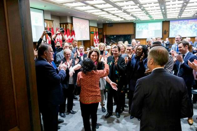 March 11, 2026, Ottawa, On, CAN: MP for Nunavut Lori Idlout, who crossed the floor from the NDP to the Liberals, is embraced by Liberal MP Sima Acan as she arrives for a meeting of the Liberal caucus with Prime Minister Mark Carney, right, on Parliament Hill in Ottawa, on Wednesday, March 11, 2026. Ottawa CAN - ZUMAc35_ 20260311_zaf_c35_015 Copyright: xJustinxTangx