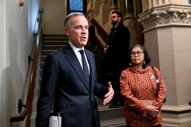 March 11, 2026, Ottawa, On, Canada: Prime Minister Mark Carney and Nunavut MP Lori Idlout, who crossed the floor from the NDP to the Liberals, make their way to a meeting of the Liberal caucus on Parliament Hill in Ottawa, on Wednesday, March 11, 2026. Ottawa Canada  - ZUMAc35_ 20260311_zaf_c35_023 Copyright: xSpencerxColbyx