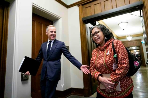 March 11, 2026, Ottawa, On, CAN: Prime Minister Mark Carney arrives at Parliament with MP for Nunavut Lori Idlout, who crossed the floor from the NDP to the Liberals, in Ottawa on Wednesday, March 11, 2026. Ottawa CAN  - ZUMAc35_ 20260311_zaf_c35_030 Copyright: xJustinxTangx