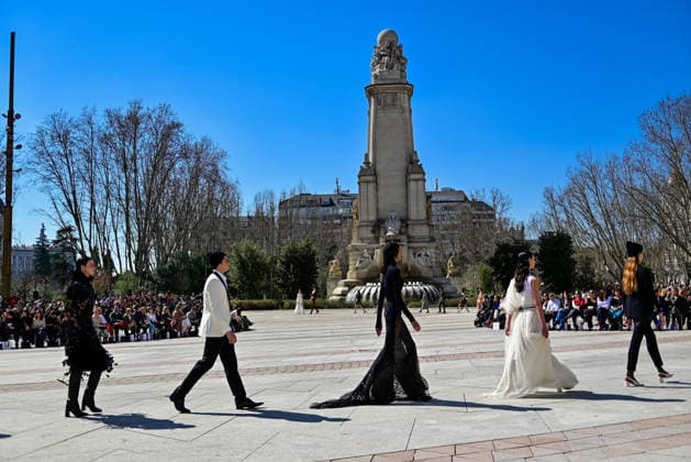 March 12, 2026, Madrid, Madrid, SPAIN: Models walk the runway on the urban catwalk set up in Plaza de EspaoÂ±a during the opening event of OMODA Madrid es Moda, marking the start of Madrid Fashion Week. The show brings together 25 Spanish independent fashion designers in one of the capital s most iconic locations. Madrid SPAIN - ZUMAz108 20260312_znp_z108_016 Copyright: xRichardxZubelzux