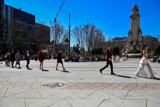 March 12, 2026, Madrid, Madrid, SPAIN: Models walk the runway on the urban catwalk set up in Plaza de EspaoÂ±a during the opening event of OMODA Madrid es Moda, marking the start of Madrid Fashion Week. The show brings together 25 Spanish independent fashion designers in one of the capital s most iconic locations. Madrid SPAIN - ZUMAz108 20260312_znp_z108_026 Copyright: xRichardxZubelzux