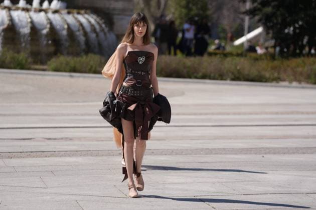 March 12, 2026, Madrid, Madrid, SPAIN: Models walk the runway on the urban catwalk set up in Plaza de Espana during the opening event of OMODA Madrid es Moda, marking the start of Madrid Fashion Week. The show brings together 25 Spanish independent fashion designers in one of the capital s most iconic locations Cordon Press 