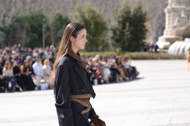 March 12, 2026, Madrid, Madrid, SPAIN: Models walk the runway on the urban catwalk set up in Plaza de Espana during the opening event of OMODA Madrid es Moda, marking the start of Madrid Fashion Week. The show brings together 25 Spanish independent fashion designers in one of the capital s most iconic locations Cordon Press 