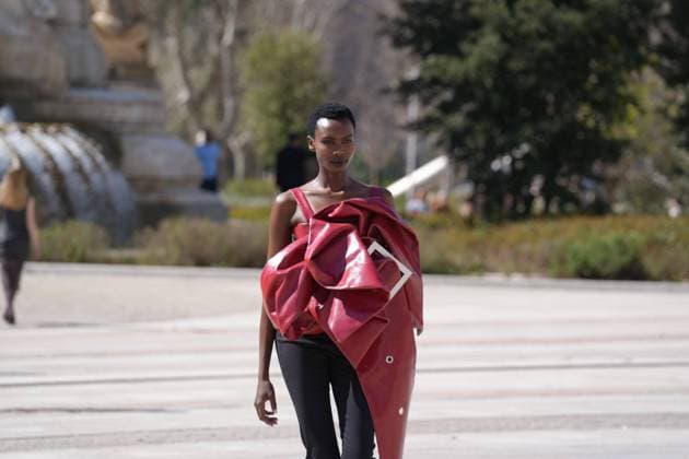 March 12, 2026, Madrid, Madrid, SPAIN: Models walk the runway on the urban catwalk set up in Plaza de Espana during the opening event of OMODA Madrid es Moda, marking the start of Madrid Fashion Week. The show brings together 25 Spanish independent fashion designers in one of the capital s most iconic locations Cordon Press 