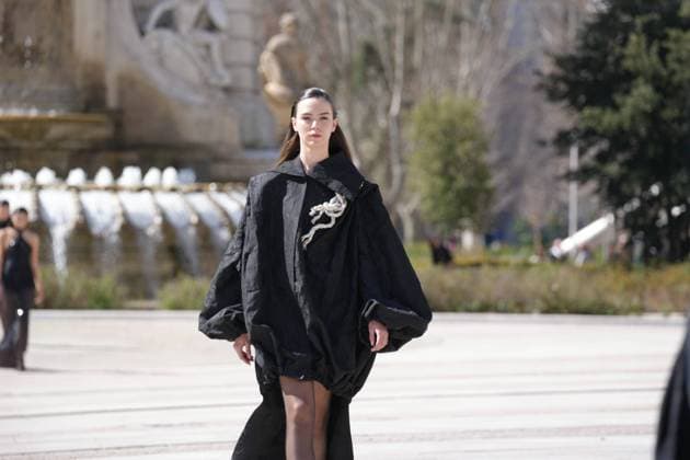 March 12, 2026, Madrid, Madrid, SPAIN: Models walk the runway on the urban catwalk set up in Plaza de Espana during the opening event of OMODA Madrid es Moda, marking the start of Madrid Fashion Week. The show brings together 25 Spanish independent fashion designers in one of the capital s most iconic locations Cordon Press 