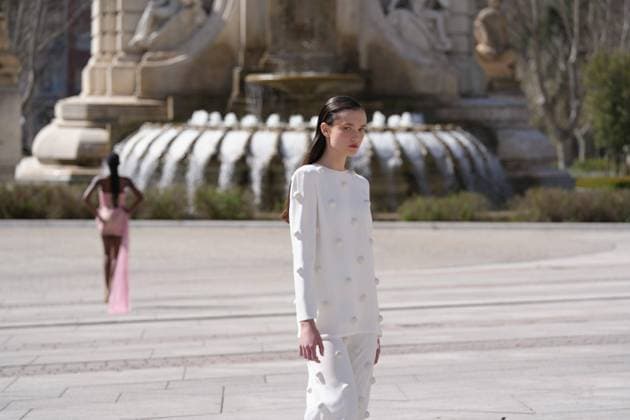 March 12, 2026, Madrid, Madrid, SPAIN: Models walk the runway on the urban catwalk set up in Plaza de Espana during the opening event of OMODA Madrid es Moda, marking the start of Madrid Fashion Week. The show brings together 25 Spanish independent fashion designers in one of the capital s most iconic locations Cordon Press 