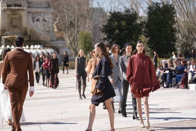 March 12, 2026, Madrid, Madrid, SPAIN: Models walk the runway on the urban catwalk set up in Plaza de Espana during the opening event of OMODA Madrid es Moda, marking the start of Madrid Fashion Week. The show brings together 25 Spanish independent fashion designers in one of the capital s most iconic locations Cordon Press 