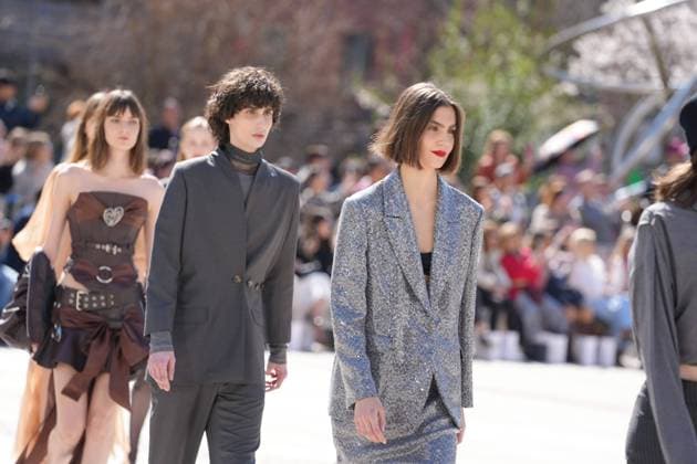 March 12, 2026, Madrid, Madrid, SPAIN: Models walk the runway on the urban catwalk set up in Plaza de Espana during the opening event of OMODA Madrid es Moda, marking the start of Madrid Fashion Week. The show brings together 25 Spanish independent fashion designers in one of the capital s most iconic locations Cordon Press 