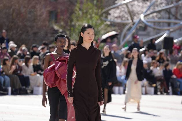 March 12, 2026, Madrid, Madrid, SPAIN: Models walk the runway on the urban catwalk set up in Plaza de Espana during the opening event of OMODA Madrid es Moda, marking the start of Madrid Fashion Week. The show brings together 25 Spanish independent fashion designers in one of the capital s most iconic locations Cordon Press 