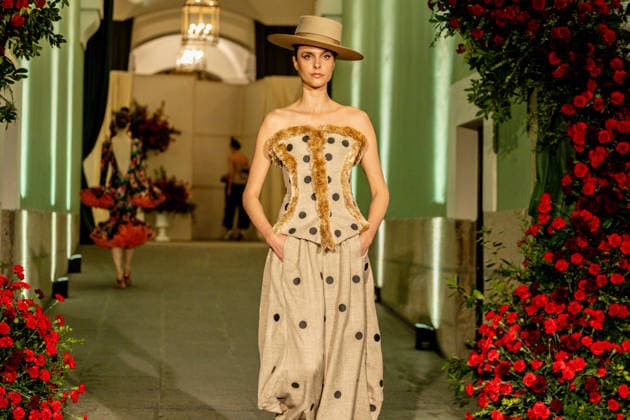 Juana Martín presents her new collection of flamenco fashion and prêt a porter A model parades presenting the new collection of flamenco fashion and prêt a porter of the designer Juana Martín, at the Real Academia de Bellas Artes de San Fernando, on March 12, 2026, in Madrid Spain Juana Martín, designer from Cordoba of gypsy origin and the first Spanish woman to parade in the Haute Couture in Paris, presents today her flamenco collection Herencia The fashion show, framed in the Madrid fashion week OMODA Madrid es Moda , is her only event in Spain in 2026 and pays tribute to the flower as a timeless symbol of flamenco 12 MARCH 2026 FASHION DESIGNER COLLECTION MODEL SHOWS SHOWS catwalk Madrid Madrid Spain  Copyright: xRicardoxRubiox 7361768