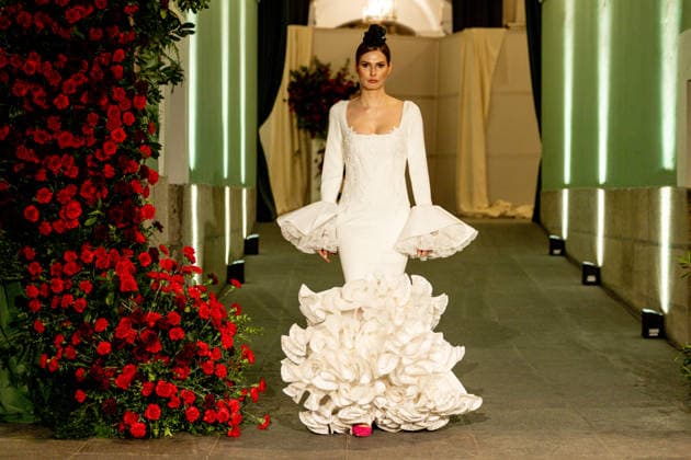Juana Martín presents her new collection of flamenco fashion and prêt a porter A model parades presenting the new collection of flamenco fashion and prêt a porter of the designer Juana Martín, at the Real Academia de Bellas Artes de San Fernando, on March 12, 2026, in Madrid Spain Juana Martín, designer from Cordoba of gypsy origin and the first Spanish woman to parade in the Haute Couture in Paris, presents today her flamenco collection Herencia The fashion show, framed in the Madrid fashion week OMODA Madrid es Moda , is her only event in Spain in 2026 and pays tribute to the flower as a timeless symbol of flamenco 12 MARCH 2026 FASHION DESIGNER COLLECTION MODEL SHOWS SHOWS catwalk Madrid Madrid Spain  Copyright: xRicardoxRubiox 7361771