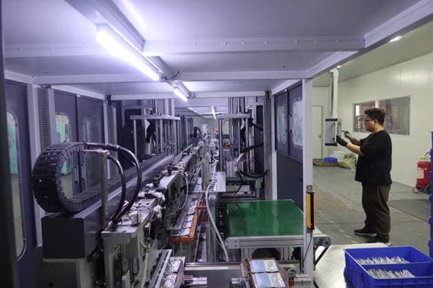 Lithium-ion Batteries Manufacturing in Sanmenxia SANMENXIA, CHINA - MARCH 12, 2026 - A worker in the production workshop of Henan Pude New Energy Technology Co., Ltd. is engaged in the production of lithium-ion batteries in Sanmenxia City, Henan Province, China on March 12, 2026. Sanmenxia Henan China  Copyright: xCFOTOx i1773416480608