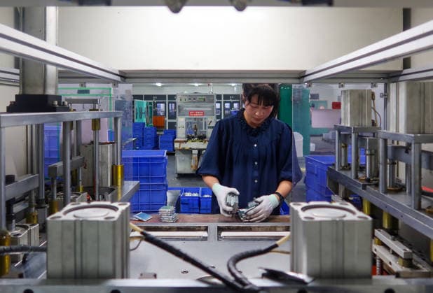 Lithium-ion Batteries Manufacturing in Sanmenxia SANMENXIA, CHINA - MARCH 12, 2026 - A worker in the production workshop of Henan Pude New Energy Technology Co., Ltd. is engaged in the production of lithium-ion batteries in Sanmenxia City, Henan Province, China on March 12, 2026. Sanmenxia Henan China  Copyright: xCFOTOx i1773416480777