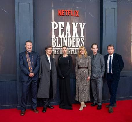 Kino, Filmpremiere von Peaky Blinders, The Immortal Man im Kino International in Berlin, im Bild v. l. Autor Steven Knight, Schauspieler Cillian Murphy, Schauspielerin Rebecca Ferguson, Katja Hofem (Vice President Content DACH für Netflix in Deutschland, Österreich und der Schweiz), Regisseur Tom Harper, Produzent Guy Heeley, 12.03. 2026, Copyright: xMatthiasxKochx