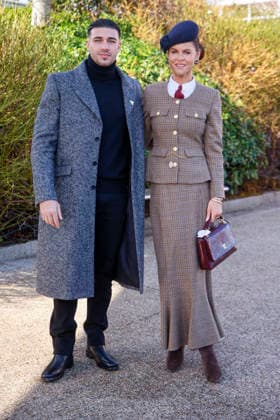 . 13 03 2026. Cheltenham, United Kingdom. Tommy Fury and Jade Holland Cooper. arriving for the Cheltenham Gold Cup on the final day of the Cheltenham Festival, United Kingdom.  xi-Imagesx IIM-26632-0020