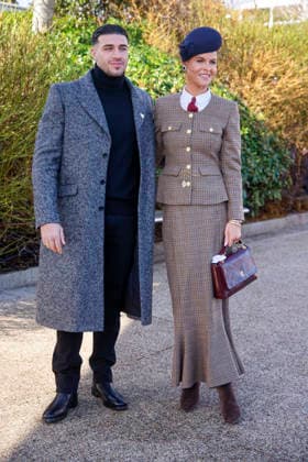 . 13 03 2026. Cheltenham, United Kingdom. Tommy Fury and Jade Holland Cooper. arriving for the Cheltenham Gold Cup on the final day of the Cheltenham Festival, United Kingdom.  xi-Imagesx IIM-26632-0021