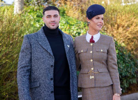 . 13 03 2026. Cheltenham, United Kingdom. Tommy Fury and Jade Holland Cooper. arriving for the Cheltenham Gold Cup on the final day of the Cheltenham Festival, United Kingdom.  xi-Imagesx IIM-26632-0022