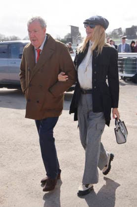 . 13 03 2026. Cheltenham, United Kingdom. Jeremy Clarkson and Lisa Hogan arriving for the Cheltenham Gold Cup on the final day of the Cheltenham Festival, United Kingdom.  xi-Imagesx IIM-26632-0026