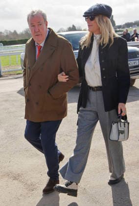 . 13 03 2026. Cheltenham, United Kingdom. Jeremy Clarkson and Lisa Hogan arriving for the Cheltenham Gold Cup on the final day of the Cheltenham Festival, United Kingdom.  xi-Imagesx IIM-26632-0027