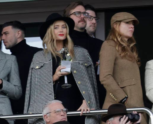 . 13 03 2026. Cheltenham, United Kingdom. Laura Whitmore watches the races on the final day of the Cheltenham Festival, United Kingdom.  xi-Imagesx IIM-26632-0051