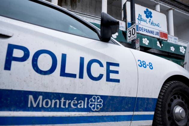 March 13, 2026, Montreal, Pq, CANADA: Police stand by outside a convenience store where a man was killed the day before, in Montreal on Friday, March 13, 2026. Montreal CANADA  - ZUMAc35_ 20260313_zaf_c35_092 Copyright: xChristopherxKatsarovx