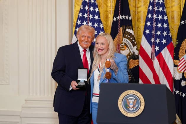 Trump Hosts Women s History Month Event Kaillie Humphries, United States Olympic bronze medalist bobsled athlete, presents the Order of Ikkos to US President Donald J Trump during a Women s History Month event in the East Room of the White House in Washington, DC, USA, on Thursday, March 12, 2026. Every year, March is designated Women s History Month by presidential proclamation. Credit: CNP AdMedia Washington District of Columbia United States of America EDITORIAL USE ONLY  Copyright: xx FTP_AD_04020_1-6137913 CNPx xAdMediax admphotostwo974268