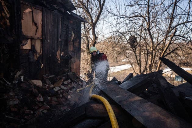 Aftermath of Russian attack in Sumy, Ukraine SUMY, UKRAINE - MARCH 14: A firefighter extinguishes a fire in the remains of a house after a Russian drone attack in Sumy, Ukraine, on March 14, 2026. Francisco Richart Anadolu Sumy Ukraine. Editorial use only. Please get in touch for any other usage.  Copyright: x2026xAnadoluxFranciscoxRichartx