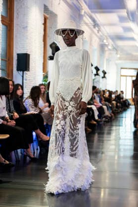 Adlib Ibiza - MadridEsModa Fashion Week Madrid - 14 Mar 2026 A model walks the runway wearing a design by Adlib Ibiza during the MadridEsModa Fashion Week de at Madrid Arena. Madrid Spain Copyright: xAtilanoxGarciax xSOPAxImagesx photos08406