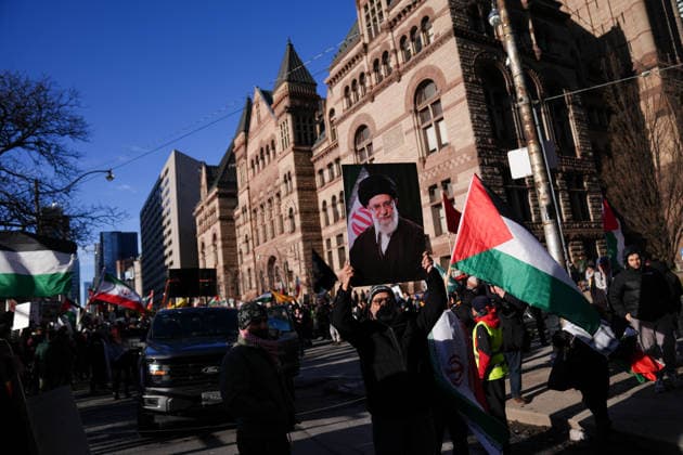 Al-Quds Day Rally in Toronto TORONTO, CANADA - MARCH 14 : People take part in a Al-Quds Day rally in Toronto, Ontario, Canada on March 14, 2026. Demonstrators carrying Palestinian and Iranian flags gathered near US Consulate General to protest Israel and the United States attacks on Iran and Lebanon, and marched in downtown Toronto. Mert Alper Dervis Anadolu Toronto Canada. Editorial use only. Please get in touch for any other usage.  Copyright: x2026xAnadoluxMertxAlperxDervisx