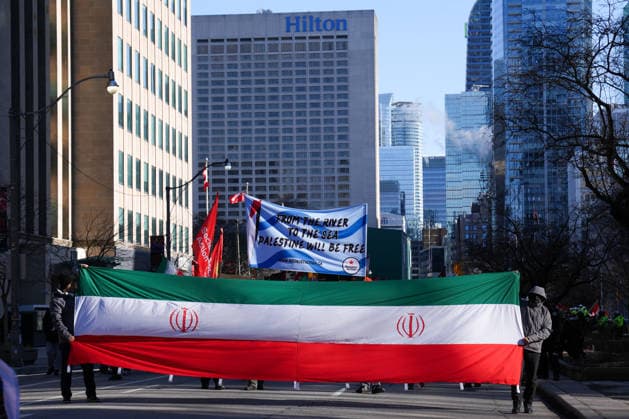 Al-Quds Day Rally in Toronto TORONTO, CANADA - MARCH 14 : People take part in a Al-Quds Day rally in Toronto, Ontario, Canada on March 14, 2026. Demonstrators carrying Palestinian and Iranian flags gathered near US Consulate General to protest Israel and the United States attacks on Iran and Lebanon, and marched in downtown Toronto. Mert Alper Dervis Anadolu Toronto Canada. Editorial use only. Please get in touch for any other usage.  Copyright: x2026xAnadoluxMertxAlperxDervisx