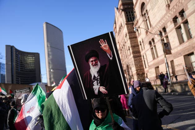 Al-Quds Day Rally in Toronto TORONTO, CANADA - MARCH 14 : People take part in a Al-Quds Day rally in Toronto, Ontario, Canada on March 14, 2026. Demonstrators carrying Palestinian and Iranian flags gathered near US Consulate General to protest Israel and the United States attacks on Iran and Lebanon, and marched in downtown Toronto. Mert Alper Dervis Anadolu Toronto Canada. Editorial use only. Please get in touch for any other usage.  Copyright: x2026xAnadoluxMertxAlperxDervisx