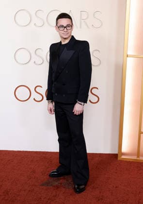Christian Siriano arrives on the red carpet for the 98th annual Academy Awards in the Hollywood section of Los Angeles on Sunday, March 15, 2026. Conan O Brien will host the Oscars for the second consecutive year.  LAP20260315406 JOHNxANGELILLO