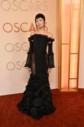 May Hong arrives on the red carpet for the 98th annual Academy Awards in the Hollywood section of Los Angeles on Sunday, March 15, 2026. Conan O Brien will host the Oscars for the second consecutive year.  LAP20260315115 JIMxRUYMEN