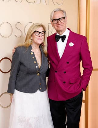 Laurie Feig and Paul Feig arrive on the red carpet for the 98th annual Academy Awards in the Hollywood section of Los Angeles on Sunday, March 15, 2026. Conan O Brien will host the Oscars for the second consecutive year.  LAP20260315419 JOHNxANGELILLO