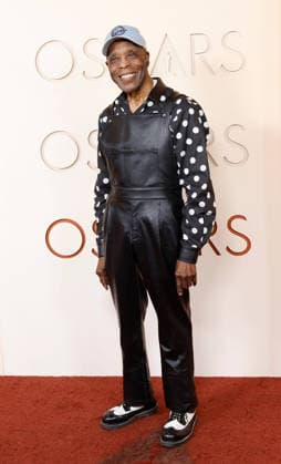 Buddy Guy arrives on the red carpet for the 98th annual Academy Awards in the Hollywood section of Los Angeles on Sunday, March 15, 2026. Conan O Brien will host the Oscars for the second consecutive year.  LAP20260315430 JOHNxANGELILLO