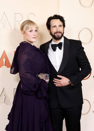 (L-R) Natalie McQueen and Josh Groban arrive on the red carpet for the 98th annual Academy Awards in the Hollywood section of Los Angeles on Sunday, March 15, 2026. Conan O Brien will host the Oscars for the second consecutive year.  LAP20260315432 JOHNxANGELILLO