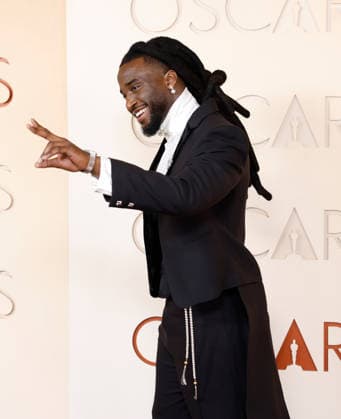Shaboozey arrives on the red carpet for the 98th annual Academy Awards in the Hollywood section of Los Angeles on Sunday, March 15, 2026. Conan O Brien will host the Oscars for the second consecutive year.  LAP20260315437 JOHNxANGELILLO