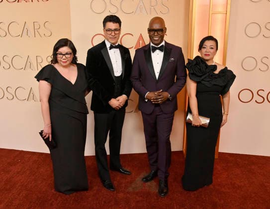 Judy Lung, Jeffrey Remedios, Cameron Bailey, and Anita Lee arrive on the red carpet for the 98th annual Academy Awards in the Hollywood section of Los Angeles on Sunday, March 15, 2026. Conan O Brien will host the Oscars for the second consecutive year.  LAP20260315150 JIMxRUYMEN