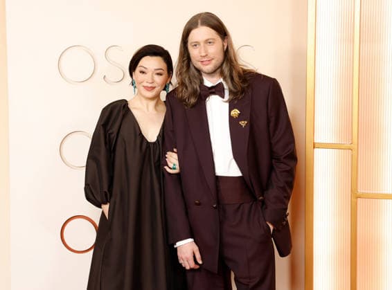 (L-R) Serena Göransson and Ludwig Göransson arrive on the red carpet for the 98th annual Academy Awards in the Hollywood section of Los Angeles on Sunday, March 15, 2026. Conan O Brien will host the Oscars for the second consecutive year.  LAP20260315496 JOHNxANGELILLO