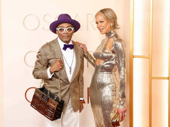 (L-R) Spike Lee and Tonya Lewis Lee arrive on the red carpet for the 98th annual Academy Awards in the Hollywood section of Los Angeles on Sunday, March 15, 2026. Conan O Brien will host the Oscars for the second consecutive year.  LAP20260315498 JOHNxANGELILLO