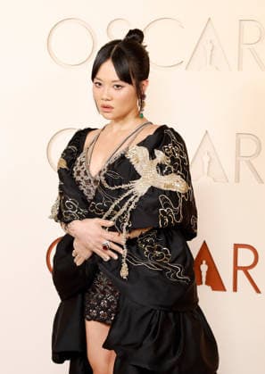 Rei Ami arrives on the red carpet for the 98th annual Academy Awards in the Hollywood section of Los Angeles on Sunday, March 15, 2026. Conan O Brien will host the Oscars for the second consecutive year.  LAP20260315508 JOHNxANGELILLO