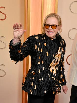 Amy Madigan arrives on the red carpet for the 98th annual Academy Awards in the Hollywood section of Los Angeles on Sunday, March 15, 2026. Conan O Brien will host the Oscars for the second consecutive year.  LAP20260315195 JIMxRUYMEN