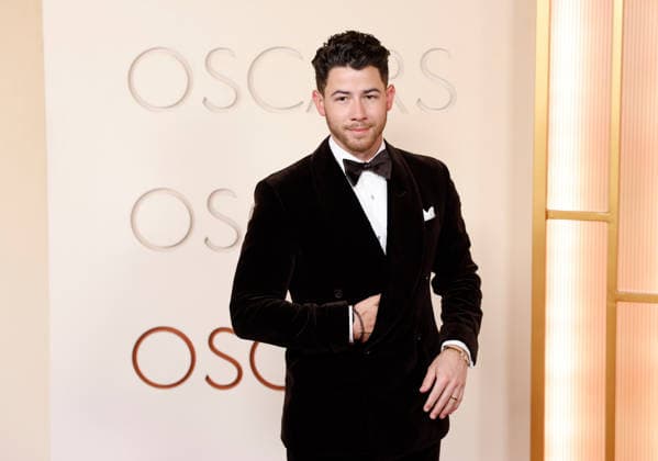 Nick Jonas attends the 98th Oscars on the red carpet for the 98th annual Academy Awards in the Hollywood section of Los Angeles on Sunday, March 15, 2026. Conan O Brien will host the Oscars for the second consecutive year.  LAP20260315645 JOHNxANGELILLO