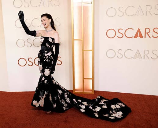 Anne Hathaway attends the 98th Oscars on the red carpet for the 98th annual Academy Awards in the Hollywood section of Los Angeles on Sunday, March 15, 2026. Conan O Brien will host the Oscars for the second consecutive year.  LAP20260315674 JOHNxANGELILLO